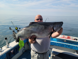Angler holds big 29-inch fish in WI