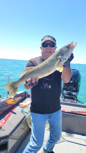 A fisherman holds a 22-inch fish in OH