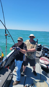 Two people enjoying a fishing trip at Lakeside Marblehead
