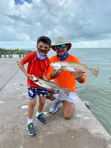 Two anglers fishing in League City