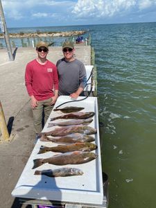 Guided fishing with Corks and Croakers.