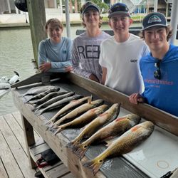 4 people fishing in League City