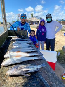 4 people fishing in League City