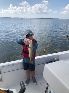 Angler holding a fishing rod in TX