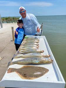 Three big fish caught during a fishing trip in League City