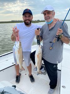 Two people fishing in League City