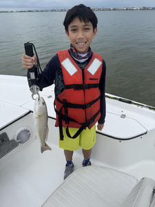 Stormy skies can't stop the redfish bite in League City!