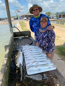 Two people fishing in League City