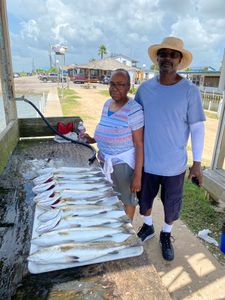 Anglers enjoying fishing adventure in TX