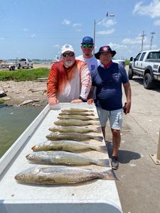 3 people fishing at League City