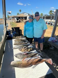 Two people fishing at League City