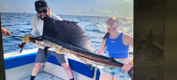 Atlantic sailfish caught during deep sea fishing trip showing distinctive dorsal fin
