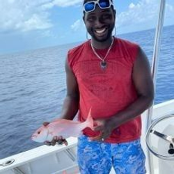 Nothing beats the thrill of landing a fresh catch during an offshore fishing adventure!