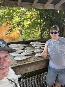 Two people fishing in LA