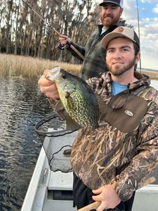 Anglers catch a crappie in Jacksonville