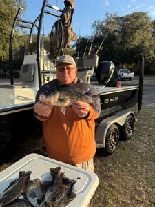 Angler catching a crappie fish in Jacksonville