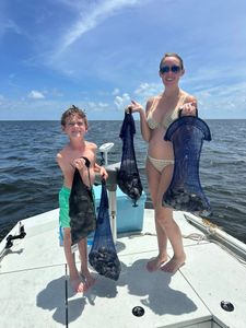 Two fishermen enjoying a great day of fishing in Jacksonville