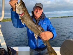 Angler with a 21 inch fish in Peru