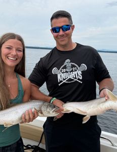 Two anglers in Peru with two fish