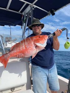 A single fisherman enjoying a day of fishing at Cape Canaveral
