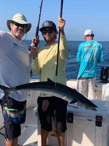 Three people fishing at Cape Canaveral