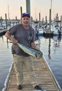 Angler enjoying a day of fishing at Carolina Beach