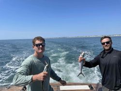 Two people fishing at Carolina Beach