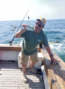 A person fishing at Carolina Beach