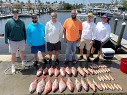 Group of 6 people enjoying fishing trip in FL