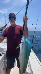 A fisherman with a 24-inch catch in Florida