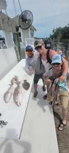 Three people fishing in FL