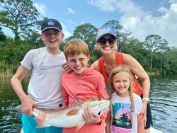 4 people fishing in Florida
