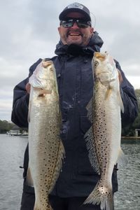 Two spotted weakfish, 22 inches long, caught while fishing in Niceville
