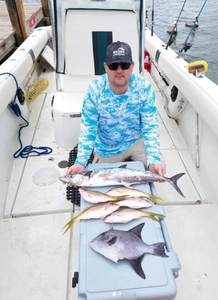 Angler with three large Grey Triggerfish and King Mackerel caught in Key Largo
