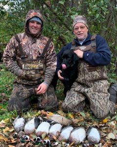 Two people hunting in North Rose