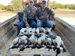 Two people enjoying fishing and hunting adventure in TX