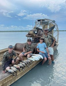 4 people fishing and hunting in TX