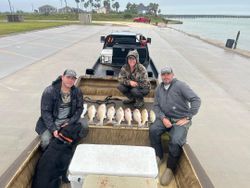 Three anglers enjoying a fishing trip in TX