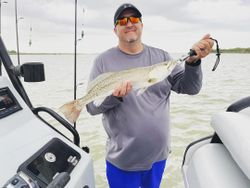 Lone angler fishing in Port Mansfield