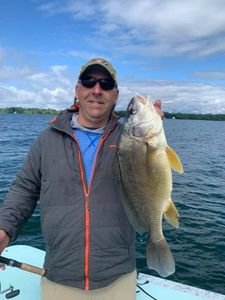 Angler holding a 21-inch fish in VT