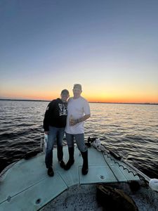 Two people fishing in Burlington.