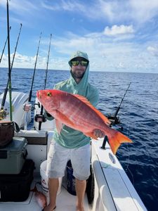 A person fishing in Vermont
