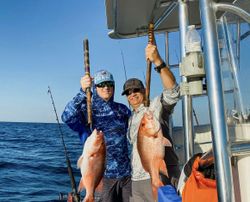 Two anglers enjoying a great fishing trip at Fort Walton Beach