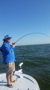 Person enjoying fishing in Galveston