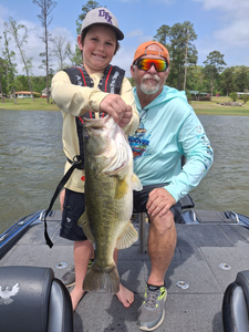 Reeling in a big one on the lake.