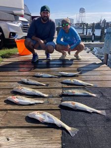 Two anglers fishing in North Carolina, catching 6 unspecified fish