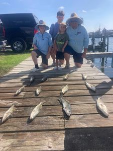 Four friends enjoying fishing trip in NC