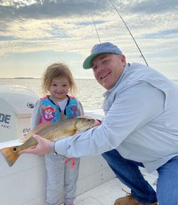 Redfish caught by two anglers in Wanchese