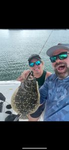 A photo of a Southern Flounder fish caught while fishing in FL