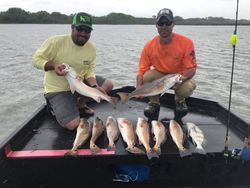 Two people fishing with 10 big fish in Port O'Connor